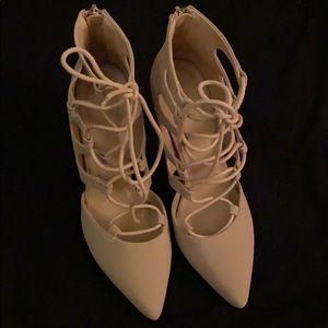 Women’s nude lace up high heels